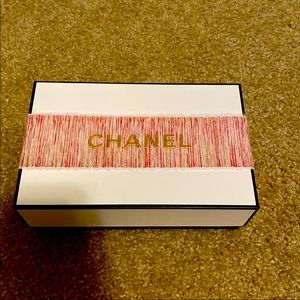 Chanel Box + Pretty red ribbon. Sticker + tissue